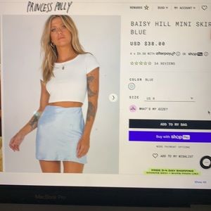 Princess Polly mini skirt blue. Never worn. New.